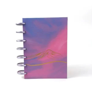 Libreta B6 Villarica Sunset con paisaje de montaña en tonos morados y rosados